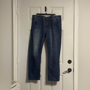 T28a- UNITED DENIM Medium Wash Distressed Denim Jeans